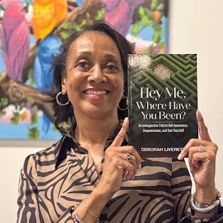 Deborah Liverett holding book 2